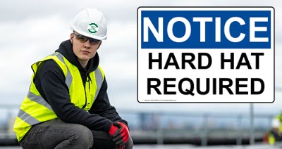 Construction worker wearing a hard hat to protect his head