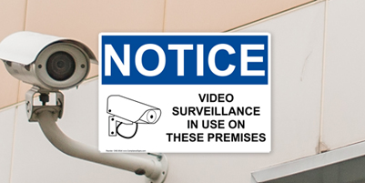 Security camera sign and outdoor video camera