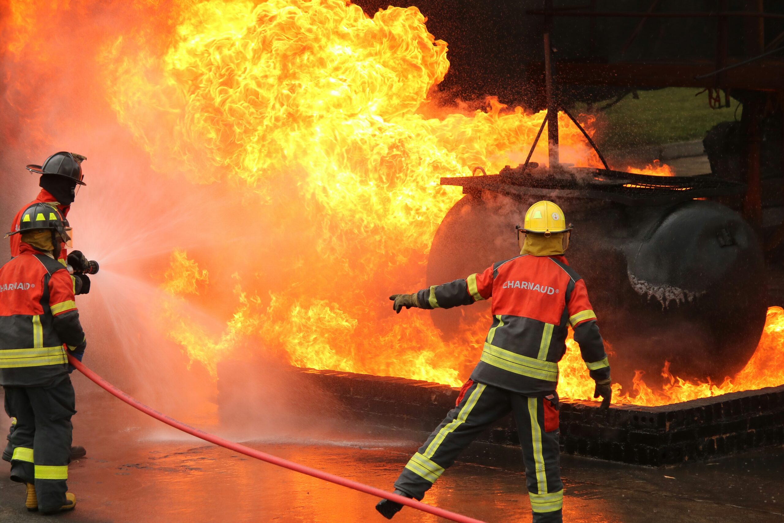 Fire extinguisher mounted on an industrial wall as part of workplace emergency preparedness
