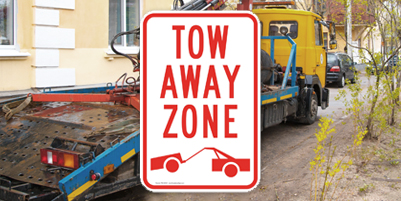 Red and White Tow Away Zone Sign