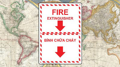 Fire extinguisher sign with English & Vietnamese text on world map background