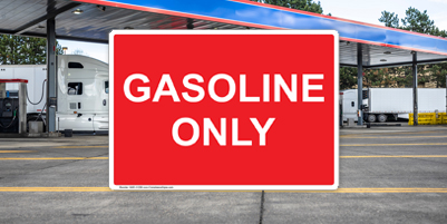 Red Gasoline Only Sign at Gas Station