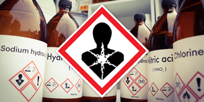 GHS Health Hazard Label and Chemical Bottles